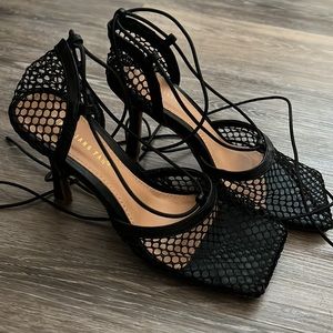 Mesh kitty heel.